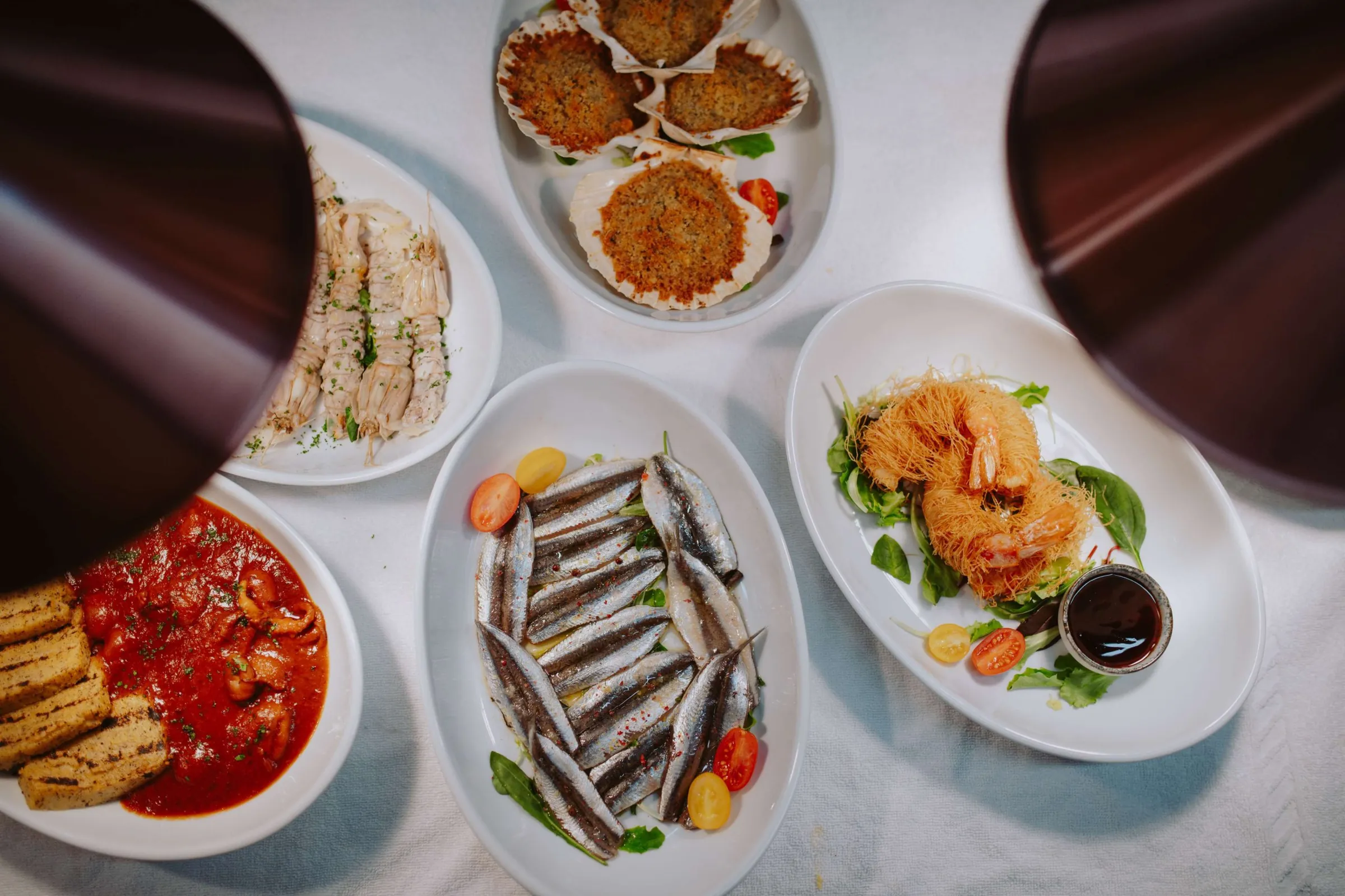 Gli antipasti di pesce in condivisione Da Fabio e Naty